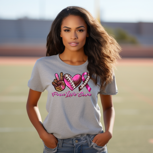 Score for Hope: 'Peace Love Cure' Cancer Football Tee